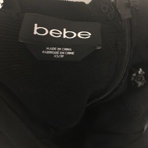 Black bodycon dress with lace trim